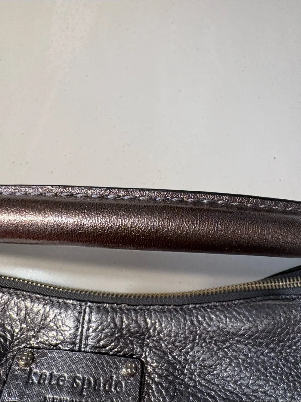 Kate Spade Janaya shiny silver hobo bag